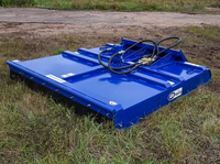 Thumbnail for The image shows a Brush Mower-Professional Series sitting on top of a grassy field. The mower blue with white and black accents.