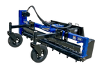 A heavy-duty power rake attached to a tractor, used for breaking up and leveling soil.