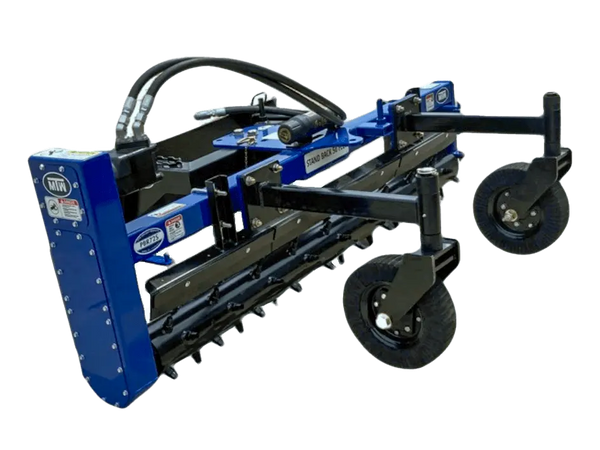 A heavy-duty power rake - professional attached to a tractor, used for breaking up and leveling soil.