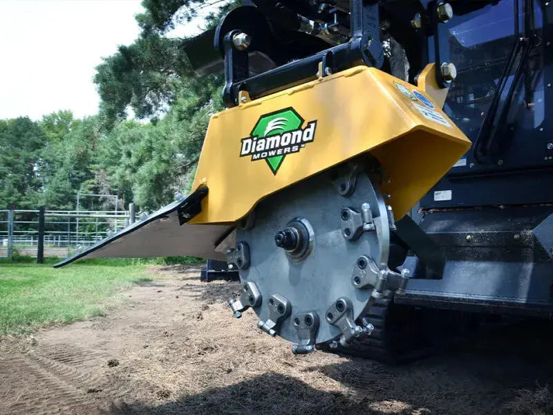 Powerful diamond mower pulverizes a stubborn tree stump.