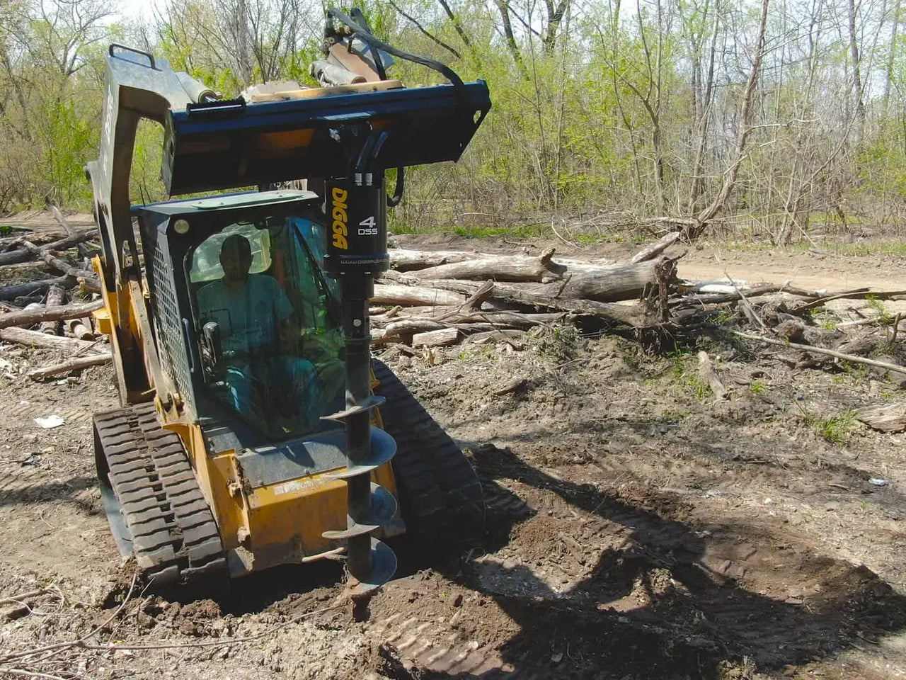 A detailed digital illustration of a bulldozer operator maneuvering his machine through a wooded landscape. The bulldozer’s powerful blade is pushing aside trees and vegetation to create a new pathway.