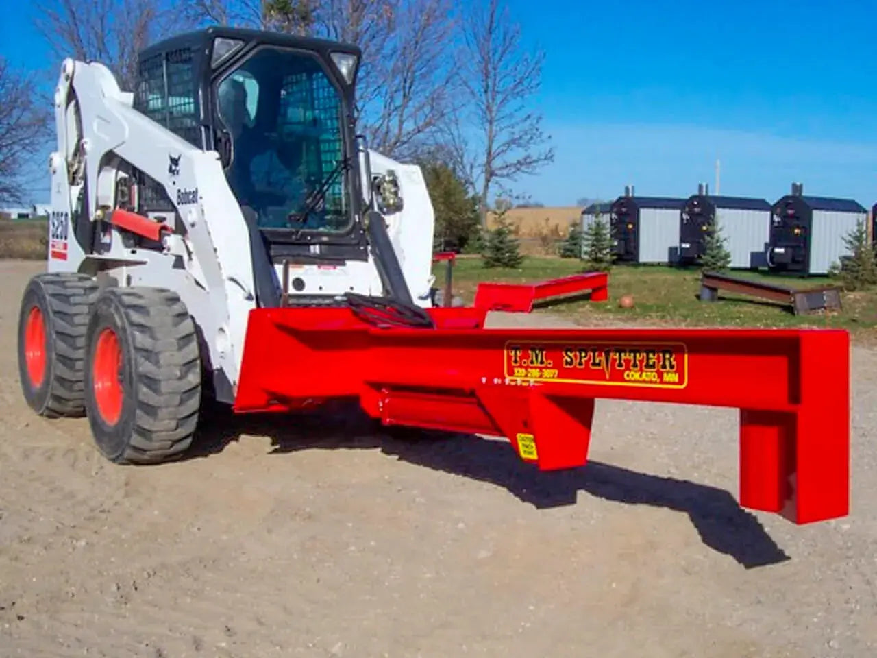 A log splitter, which is a machine used to split logs of wood into smaller pieces. Log splitters are often used by people who burn wood for heat or who make their own firewood.