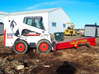 Thumbnail for A Bobcat skid steer with a Pro Series Wood Splitter attachment parked on a pile of logs.